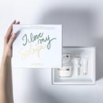 Sisley Paris Sisleya L'Integral Anti-Age Duo - Includes Anti-Aging Face Moisturizer (50 mL), Eye and Lip Contour Cream (15 mL) with Massage Tool & Concentrated Firming Body Cream (15 mL) - Image 2