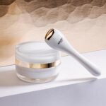 Sisley Paris Sisleya L'Integral Anti-Age Duo - Includes Anti-Aging Face Moisturizer (50 mL), Eye and Lip Contour Cream (15 mL) with Massage Tool & Concentrated Firming Body Cream (15 mL) - Image 4