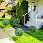HOMCOM Set of 2 1.3ft (15.7") Artificial Boxwood Topiary Ball Bush with Integrated Ground Stake, Indoor Outdoor UV Resistant Faux Greenery, Faux Plants for Garden, Porch, Balcony - Image 2